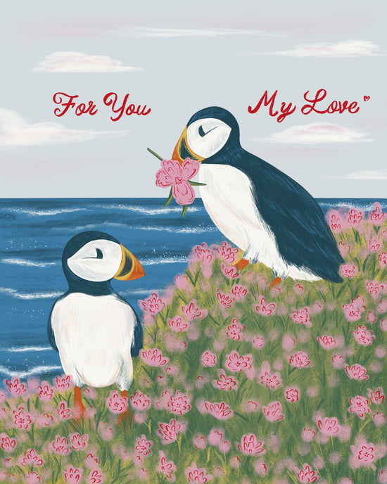 A square art print featuring an illustration of two puffins by the ocean, with one puffin holding pink flowers. The text 'For You My Love' is written in red script across the top.